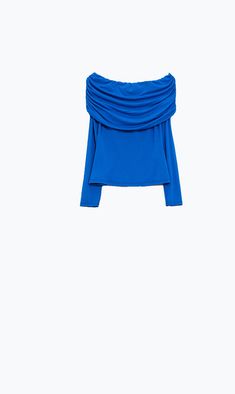 Elevate your style with our electric blue bardot long sleeve top. The stunning electric blue color and off-the-shoulder design will make you stand out in a crowd. This top is flattering, stylish and perfect for a night out paired with wide leg trousers or denim for a casual day look. Ruched design Bodycon fit Lightweight woven fabric Runs small, size up Model is 5'9" and wears size small Hand wash only Made in Italy Blue Off-shoulder Party Blouse, Blue Off-shoulder Top For Fall, Blue Off-shoulder Evening Tops, Stretch Long Sleeve Off-shoulder Top For Night Out, Spring Off-shoulder Long Sleeve Top For Night Out, Stretch Off-shoulder Top With Long Sleeves For Night Out, Spring Long Sleeve Off-shoulder Party Top, Spring Party Long Sleeve Off-shoulder Top, Chic Blue Top For Night Out