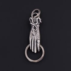 Antique Reproduction Hand Charm Holder Pendant of Sterling Silver - Trademark Antiques Antique Good Luck Charms Jewelry, Antique Engraved Jewelry For Good Luck, Hand Cast Metal Amulet Jewelry, Silver Brass Jewelry With Lobster Clasp, Antique Silver Hand Cast Pendant Jewelry, Hand Cast Antique Silver Pendant Jewelry, Symbolic Hand Cast Sterling Silver Jewelry, Hand-cast Antique Silver Pendant Jewelry, Symbolic Sterling Silver Jewelry