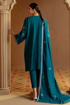 Product Details SHIRTDyed & embroidered front and sleeves (Khaddar)Dyed backTROUSERkhaddar-dyed trouser DUPATTAKhaddar embroidered shawlATTRIBUTE This TURQUOISE MEADOW-3 PC KHADDAR EMBROIDERED SUIT features a dyed & embroidered front and sleeves for a luxurious touch. The dyed back adds a subtle yet elegant look. The khaddar-dyed trouser offers comfort and style. The Khaddar embroidered shawl completes the look with a touch of traditional charm. Embroidered Shawl, Embroidered Suit, Extra Fabric, Fabric Stores Online, Jacquard Fabric, Designer Suits, Photographic Lighting, Fabric Store, Winter Collection