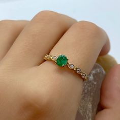 EMERALD GEM RING - Dainty Emerald Ring - Gemstone Wedding Ring Vintage - Yellow Gold Jewelry - Natural Emerald Ring - Wedding Ring Gift *100% naturel gemstone *14k solid gold *solid gold (NOT plated) *gemstone: emerald *gemstone: zircon *stone shape emerald: oval *stone shape zircon: round *stone emerald : 3x5 mm. *stone emerald ct. : 0.60-0.85 ct. *stones emerald : 1 pc. *stone zircon : 6 pcs. Wedding Emerald Ring With Diamond Accent Stones, Green Brilliant Cut Birthstone Ring For Wedding, Exquisite Emerald Promise Ring, Green Brilliant Cut Birthstone Wedding Ring, Wedding Green Brilliant Cut Birthstone Ring, Moissanite Emerald Ring For Wedding, Cubic Zirconia Emerald Ring With Accent Stones For Wedding, Emerald Crystal Ring With Accent Stones For Wedding, Wedding Emerald Ring With Cubic Zirconia Accent Stones