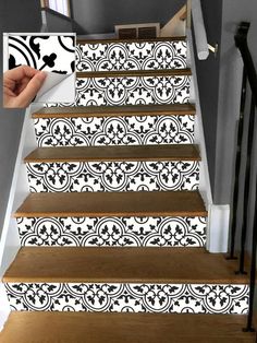 a stair case with black and white designs on it