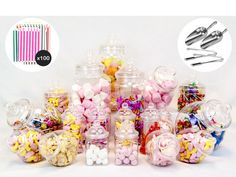 there are many different types of candy in the glass jars