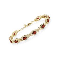 PRICES MAY VARY. Exquisite Gemstone Elegance: This stunning tennis bracelet boasts a total carat weight of 9.87, featuring a series of oval-cut red garnet gemstones. The rich red hue of the garnets exudes elegance and sophistication, making this bracelet a timeless addition to any jewelry collection. Luxurious Gold Plated Silver Setting: Crafted with high-quality 18K yellow gold plated silver, this bracelet offers a luxurious and durable design. The gold plated silver setting beautifully complem Red Oval Diamond Gemstone Bracelet, Red Oval Tennis Bracelet Fine Jewelry, Elegant Oval Bracelets With Gemstone Accents, Red Oval Diamond Classic Bracelet, Red Oval Fine Jewelry Tennis Bracelet, Red Oval Classic Diamond Bracelet, Classic Red Oval Diamond Bracelet, Luxury Red Oval Bracelet, Red Oval Diamond Bracelet As Gift