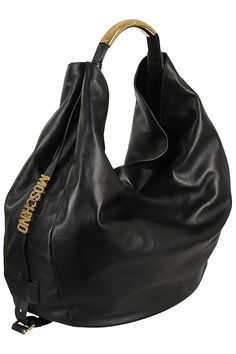 Handle Bag - Moschino - Black color - Smooth Nappa leather - Tubular metal top handle - Adjustable side belts with lettering logo - Interior magnetic closure - Dimensions: Height 45 cm, Length 65 cm, Depth 15 cm Leather Shoulder Bag With Logo For Business, Leather Business Shoulder Bag With Logo, Business Leather Shoulder Bag With Logo, Chic Leather Shoulder Bag With Logo Hardware, Chic Leather Shoulder Bag With Logo, Modern Leather Shoulder Bag With Logo, Modern Evening Shoulder Bag With Logo Strap, Everyday Leather Shoulder Bag With Metal Logo, Leather Shoulder Bag With Logo Strap For Business