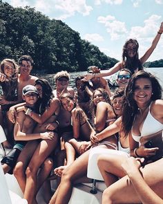 a group of people on a boat in the water