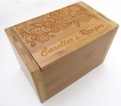 a wooden box with the name carolina's recipe engraved on it and flowers inlays