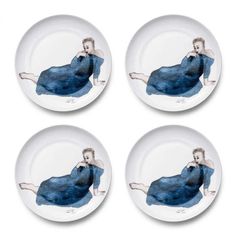 four plates with an image of a woman on them