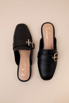 Upgrade your everyday flats with a chic new option like the Lulus Marquete Black Buckle Mule Slides! These too-cute mules have a smooth, faux leather construction that shapes an almond toe upper with a gold buckle strap and matching grommets. Classic notched collar leads to a slide-on design for effortless styling. 0. 75" rubber heel. Cushioned insole. Rubber sole has nonskid markings. Man made materials. Imported. Lulus | Marquete Black Buckle Mule Slides | Size 10. Flat Sandals With Buckle For Work, Flat Sandals With Buckle Closure For Work, Chic Flats With Buckle Closure For Fall, Chic Synthetic Flat Slip-ons, Spring Workwear Flats With Buckle Closure, Chic Open Toe Flats For Work, Chic Faux Leather Flats For Spring, Chic Faux Leather Mules With Flat Heel, Chic Flat Synthetic Slip-ons