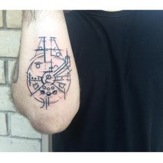 a man's arm with a clock tattoo on the left side of his arm