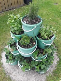 a stack of potted plants sitting on top of each other