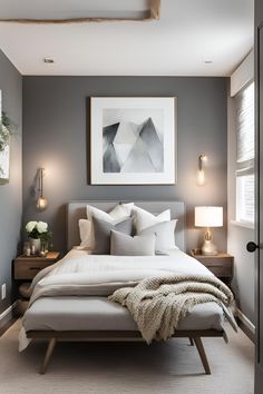 a bedroom with gray walls and white bedding