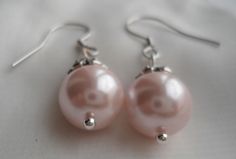 PREFERENTIAL POLICIES : The order is $25 or more.There will be a 10% discount.long-term effective. Please use the coupon code: CZH10 Welcome back to my shop: https://www.etsy.com/shop/pearlandjewelry Description of the product in the picture: I make them with 10mm light pink glass pearls and sterling silver hook (the other metal are alloy),It is nice for your wedding. The picture color is light pink. Can choose other colors are:ivory,white,light pink,Black, red, teal, gray, dark gray, turquoise, Pink Dangle Bridal Earrings For Bridesmaid Gift, Handmade Pink Bridal Earrings For Wedding, Handmade Pink Pearl Earrings For Party, Pink Earrings For Bridesmaid Gift, Pink Pearl Drop Earrings For Wedding, Pink Pearl Drop Bridal Earrings For Wedding, Dangle Pearl Earrings Wedding, Pearl Dangle Earrings Wedding, Dangle Pearl Earrings