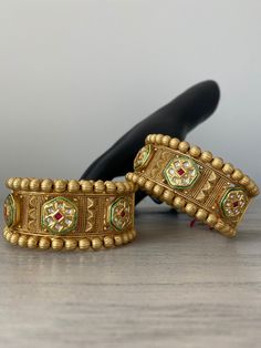 Kundan Kada Set of 2 (Size 2.6),  Kundan Bangle, Gold Plated Rajwadi Kundan Openable Kada set, Indian Kada, Rajwadi Kada, Wedding Bangles India, Bollywood Bangles, Punjabi Jewelry, Wedding Jewelry, Meenakari, Indian Jewelry, Bridal Jewelry, Pacheli Bangles Premium Quality Openable Gold Plated Kundan Bangles set of 2 (Size 2.6) Ideal for gifts and any occasion like weddings, Diwali, Anniversary, Birthday, Mother's Day, Eid, Festivals, Parties, and many more. Size: 2.6 Inches Width: Approx 1 inch Screw opening Style High-Quality brass as the base metal These Beautiful Kundan Bangles are perfect and ready to pair with your gorgeous outfit on any occasion or party. Instructions for care: It is advisable to keep your jewelry away from perfume, moisture, and other chemicals in a zip lock pouch. Kundan Kada, Punjabi Jewelry, Wedding Bangles, Kundan Bangles, Bangle Gold, Bangles Set, Jewelry Bridal, Bangle Set, Jewelry Wedding