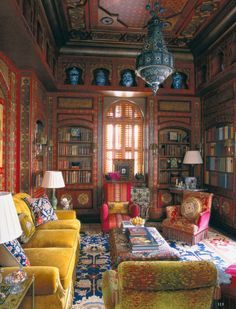 a living room filled with lots of colorful furniture