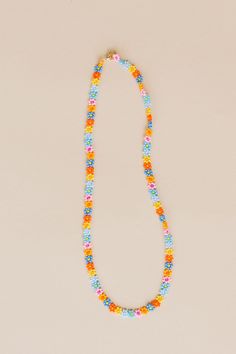 Nothing like a little daisy chain that lasts a lifetime. The Zara is hand beaded with so much love. One of our original necklaces, we always recommend Zara for a layered look, casual or dressed up, she's a perfect faux choker for everyday wear. Available in summer daisy: our combination of blue, pink, and yellow flowers with varying centers to create a bright poppy combination of flowers. - 3D Daisy chain necklace - 14k Gold fill lobster clasp - Handmade in Mexico - 17" Length 5mm width Daisy Chain Necklace, Zara Necklace, Diy Friendship Bracelets Tutorial, Flowers 3d, Original Necklace, Friendship Bracelets Tutorial, Beaded Necklace Diy, Daisy Necklace, Bead Necklaces