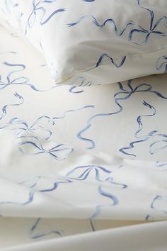 the sheets are white with blue swirls on them