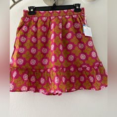 Ruffle Trim Skirt With Pockets. Elastic Waistband. Fuschia, White And Green (Variety). It Is Lined And 100% Cotton Pink Ruffle Hem Skort For Summer, Pink Skirted Skort With Ruffle Hem, Pink Flowy Skort For The Beach, Pink Skirted Skort For Vacation, Pink Tiered Skirt With Ruffle Hem, Vacation Pink Skirted Skort, Pink Cotton Mini Skirt For Vacation, Beach Skort With Ruffled Skirt In Pink, Pink Ruffled Skort For Beach