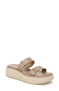 A duo of flexible leather straps enhances the everyday comfort of this laid-back sandal set on a featherweight platform sole. 3 1/4" platform Leather upper and lining/rubber sole Imported Synthetic Double Strap Wedge Sandals, Spring Double Strap Cushioned Wedge Sandals, Spring Double Strap Wedge Sandals With Cushioned Footbed, Beige Leather Wedge Sandals With Textured Sole, Synthetic Double Strap Platform Wedge Sandals, Spring Leather Platform Footbed Sandals, Spring Platform Footbed Sandals In Synthetic, Synthetic Double Strap Platform Slides, Spring Double Strap Synthetic Wedge Sandals