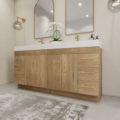 a bathroom vanity with two mirrors above it and a rug on the floor next to it