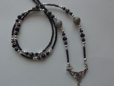 Created by me. I use Beadalon wire for durability which is made in USA. Used 2mm black glass seed beads.  Also used 4mm and 6mm crystal beads.  All my charms pendants are Tibetan Silver and it is lead and nickel free. Attached a lobster clasp for easy use. Comes from pet free, smoke free home. Thank You for looking. Adjustable Black Wire Wrapped Beaded Necklaces, Adjustable Black Wire Wrapped Beaded Necklace, Phone Craft, Beaded Lanyards, Id Badge Holders, Id Badge, Black Crystals, Badge Holders, Badge Holders Lanyard