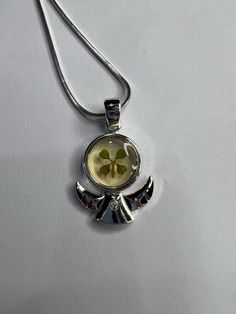 Real four-leaf clover, sterling silver charm. The diameter of the charm is Approximately 2cm (about 0.79 in). The necklace is an 18 in sterling silver chain.   This jewelry is perfect for yourself and or as a gift! Whether it's for a birthday, wedding, St. Partrick's day, or just to have; it will always bring you luck. Four Leaves, Four Leaf Clover, Clover Leaf, Sterling Silver Charm, Pretty Jewellery, Silver Charms, Sterling Silver Chains, Silver Chain, Charm Necklace