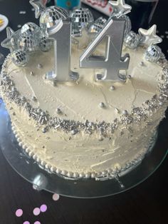 a birthday cake that has the number four on it