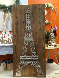 the eiffel tower is cut out of wood