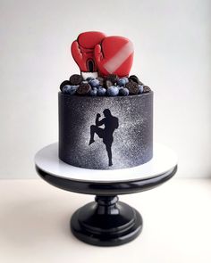 there is a cake with a boxing theme on it