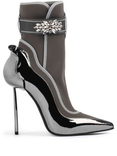 silver-tone leather metallic finish stretch-design logo print to the side crystal embellishment contrasting trim belt loops pointed toe touch-strap fastening branded leather insole stiletto heel leather sole ankle-length Pencil Heel Boots, Silver Heel, Le Silla Shoes, Fashion Shoes Sandals, Fantastic Shoes, Grey Boots, Iconic Bags, Aesthetic Shoes, Flat Boots