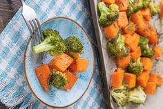 broccoli and carrots are on a plate with a fork next to it