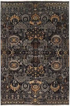 a black and gold rug with an intricate design