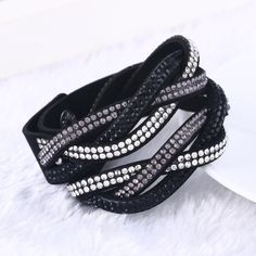 Send In The Sparkle - Radiantly Regal Bracelet A Strip Of Suede Is Spliced Into Glittery Strands. Dainty Rhinestones Interweave Around The Wrist, Creating A Mishmash Of Sparkle. The Elongated Design Allows For A Trendy Double Wrap Around The Wrist. Features An Adjustable Snap Closure. Black Crystal Bracelets With Rhinestones, Adjustable Black Crystal Rhinestone Bracelet, Adjustable Black Crystal Bracelet With Rhinestones, Trendy Black Crystal Jewelry, Black Rhinestone Bracelets As Gift, Black Rhinestone Bracelets For Gifts, Black Crystal Bracelet With Rhinestones As Gift, Black Crystal Bracelets For Party, Adjustable Black Crystal Bracelet