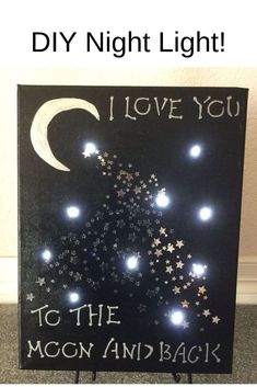 a sign that says i love you to the moon and back with stars on it