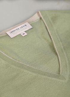 Indulge in our buttery-soft Cashmere/Extrafine Extra Lightweight Merino V-neck sweaters. Made with 2 twisted plies of the finest blended yarn, this garment is extremely versatile--perfect for wearing under a sportcoat--without any constraint in motion--or simply wear outdoors in spring or summer. This light garment features thoughtful details throughout, such as a 1/8” contrast at the inside edge of the collars and at the tip of the wrists. The cashmere originates from Arbas cashmere goats from Turtleneck Hoodie, Perfect White Shirt, St Barths, Hoodie Cardigan, Sport Dress, Business Dresses, Womens Size Chart, Tie And Pocket Square, Cashmere Sweater