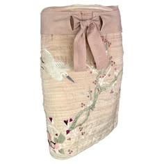 Presenting a stunning light pink Gucci embroidered skirt, designed by Tom Ford. From the Spring/Summer 2003 collection, this ombré pink pencil skirt is constructed of lightweight silk ribbon. The skirt features a built-in tie belt and is made complete with a gorgeous cherry blossom that wraps around the skirt. This iconic cherry blossom embroidery was heavily featured on the season's runway. A must-have piece for any Gucci by Tom Ford lover, this pink skirt is a beautiful addition to any wardrobe or collection. Approximate measurements: Size - removed Waistband to hem: 21" Waist: 30" Hips: 36" 100% Silk Pink Embroidered Skirt, Fitted Pink Embroidered Skirt, Spring Beige Silk Skirt, Embroidered Pink Skirt For Summer, Embroidered Pink Summer Skirt, Summer Embroidered Pink Skirt, Blossom Embroidery, Gucci By Tom Ford, Pink Pencil