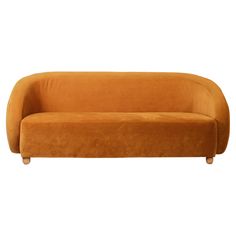 an orange couch sitting on top of a white floor