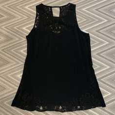 Black Sleeveless Blouse With Lace Chic Sleeveless Lace Top Camisole, Chic Black Lace Camisole Top, Black Tank Top Vest For Workwear, Elegant Black Camisole Blouse, Chic Sleeveless Lace Top, Chic Black Sleeveless Top, Chic Black Camisole Blouse, Elegant Black Sleeveless Camisole, Tank Vest Blouse For Night Out