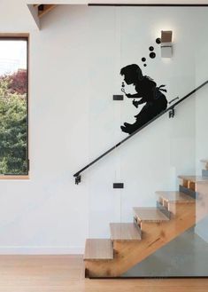 a stair case with a sticker of a girl on it