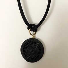 Boho Necklace With Large, Intricately Detailed, Chunky, Black Circle Pendant Attached To Thick Black Satin Cord Non-Adjustable Length And Lobster Claw Clasp Measurements: Necklace Chain Length-Approx 16” Owned For A Few Years But Never Worn Feel Free To Reach Out With Further Questions Or An Offer! Black Pendant Choker As A Gift, Elegant Black Necklace With Adjustable Length, Handmade Black Pendant Necklace, Black Necklace With Adjustable Cord As Gift, Adjustable Black Medallion Jewelry, Bohemian Black Round Necklace, Handmade Black Medallion Necklace, Handmade Black Round Choker, Handmade Black Circle Necklaces