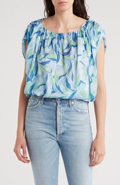 An abstract print brightens a slouchy top fashioned in a one-shoulder silhouette with a tie shoulder and elastic bubble hem. One-shoulder neck Cap sleeve; three-quarter sleeve 100% polyester Dry clean Imported Slouchy Top, Bubble Hem, Ramy Brook, Hem Top, Blue Quartz, Three Quarter Sleeves, Quarter Sleeve, Abstract Print, Cap Sleeve