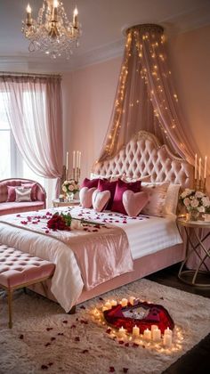 a bedroom decorated in pink and white with roses on the bed, candles lit up