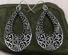 "Unique, eye catching and pretty teardrop dangle earrings. They have incredible detail and design. Dress them up or down. These earrings are versatile and perfect for everyday wear. The earrings measure 2\" long by 1 1/8\" wide. They hang from simple silver ear wire hooks. Overall drop length is 2 1/8\". Made from plated silver. I can make a matching necklace, if you would like the whole set. Please just send me a convo and we will make it happen! Thanks for stopping by! Please take a moment and Nickel Free Teardrop Earrings For Festival, Nickel-free Teardrop Earrings For Festival, Bohemian Hypoallergenic Drop Earrings, Festival Teardrop Earrings With Ear Wire, Teardrop Earrings For Festival, Bohemian Teardrop Earrings With Matching Pair, Bohemian Teardrop Pierced Earrings, Bohemian Hypoallergenic Dangle Teardrop Earrings, Bohemian Hypoallergenic Teardrop Dangle Earrings