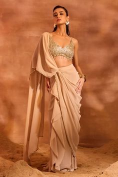 Beige solid concept pre-draped saree with border work. Comes with heavily embellished blouse with tassel details. - Aza Fashions Drape Sari, Beige Drapes, Orange Drapes, Blouse Satin, Beige Blouse, Drape Saree, Embellished Blouse, Indian Couture, Satin Blouses