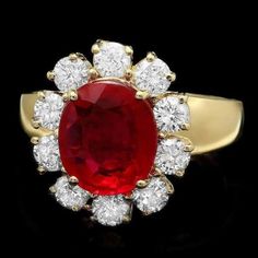 For Sale on 1stDibs - 4.60 Carats Impressive Red Ruby and Natural Diamond 14K Yellow Gold Ring Total Red Ruby Weight is: Approx. 3.40 Carats Ruby Measures: Approx. 10.00 x 8.00mm Gia Certified Gold Ruby Ring For Wedding, Exquisite Gia Certified Ruby Wedding Ring, Gia Certified Yellow Gold Ruby Wedding Ring, Gia Certified Red Rings For Wedding, Gia Certified Red Ring For Wedding, Gia Certified Red Fine Jewelry For Wedding, Gia Certified Red Wedding Ring, Red Halo Setting Jewelry For Formal Events, Red Cluster Ring With 17 Jewels For Wedding