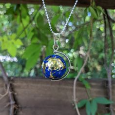 This necklace is just as described and is beautiful. I love it. - Cheryl O., Nature Reflections Customer Globe style planet Earth. Earth is of highly polished Brass applied to an Alpaca Silver Orb that has blue enamel inlay to represent the ocean. This Angel Caller is handcrafted and no two are exactly alike and the continents are free form so they are a representation but will not be accurate in its depiction. Wear if you want to tap into the energy of connection, travel and mother Earth. Great Angel Caller, Globe Earth, Deep Blue Ocean, Harmony Ball, The Orb, Earth Globe, Earth Angel, Personalized Note Cards, Brass Accents