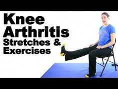 a woman sitting in a chair with her feet on the ground while holding an exercise ball