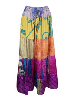 Elevate your wardrobe with the vibrant charm of this flared maxi skirt, expertly crafted from upcycled saree fabric. Showcasing rich Purple and Multi floral tones, complemented by bold, striking prints, each skirt is a unique masterpiece. Its adjustable drawstring waist and flowing ankle-length silhouette provide a flattering, comfortable fit, making it the perfect blend of boho-chic style and everyday practicality. Whether you're wandering through a farmer's market or dancing at a lively beach Bohemian Maxi Skirt For Festive Occasions, Multicolor Bohemian Maxi Skirt For Festivals, Bohemian Multicolor Maxi Skirt For Festivals, Multicolor Patchwork Maxi Skirt For Festivals, Traditional Multicolor Maxi Skirt, Traditional Multicolor Flowy Maxi Skirt, Multicolor Long Maxi Skirt For Festivals, Bohemian Multicolor Skirt For Festivals, Multicolor Harem Skirt For Festival