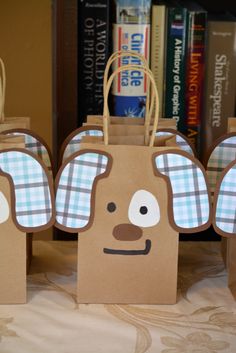 some brown paper bags with ears on them