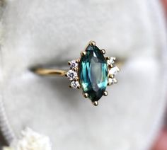 Morena Marquise Sapphire Engagement Ring With Diamonds – Capucinne Sapphire Engagement Ring Marquise, Green Engagement Rings, Marquise Sapphire, Engagement Ring Marquise, Marquise Diamond Engagement Ring, Jewelry Set Design, Rings Collection, Engagement Rings Marquise