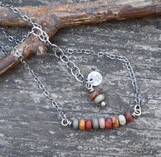 🌟PLEASE READ the following description before making your purchase.  Note measurements and size reference photos. 2x4mm earthy cherry creek jasper stones  are wrapped in sterling silver to a 2mm oxidized sterling silver flat cable chain finished with a sturdy spring clasp and 2" extender. ♥ stones will differ slightly as this necklace is made to order Artisan Brown Gemstone Necklace, Nature-inspired Brown Gemstone Bead Necklace, Brown Multi-strand Necklaces With Natural Stones, Brown Turquoise Necklace With Natural Stones, Spiritual Style, Nature-inspired Brown Jasper Necklace, Silver Flats, Jasper Necklace, Jasper Stone, Oxidized Sterling Silver